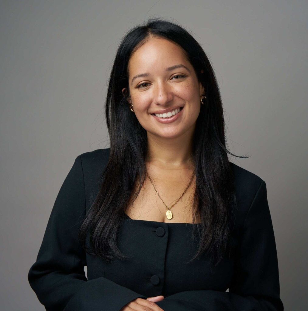 Amaranta Henriquez, LMHC, featured guest, in a black blazer